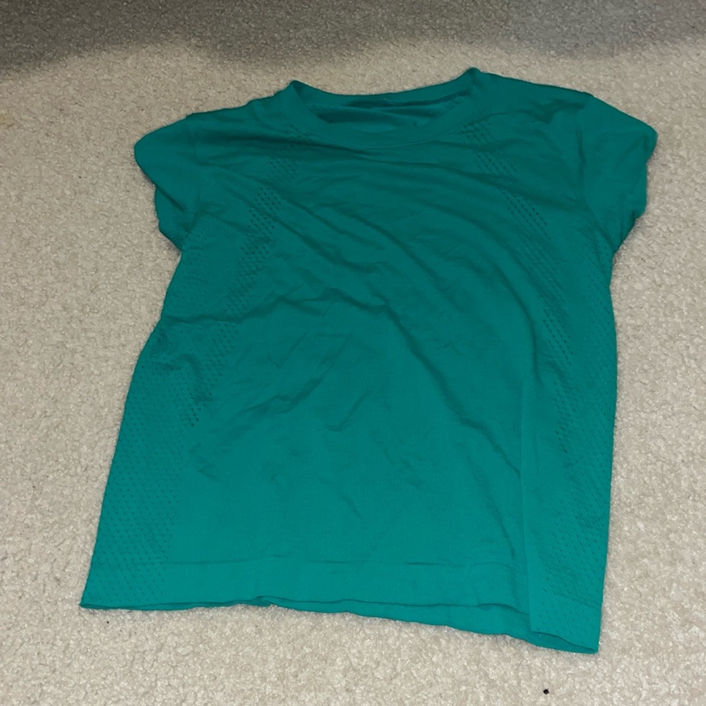 new condition, never worn, lululemon top, size 4, kelly green!